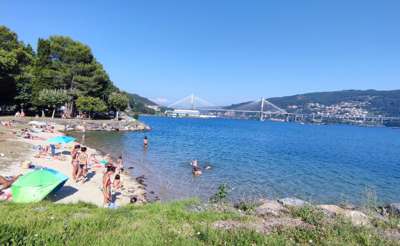 Фото Praia do Almacen с светлый песок поверхностью