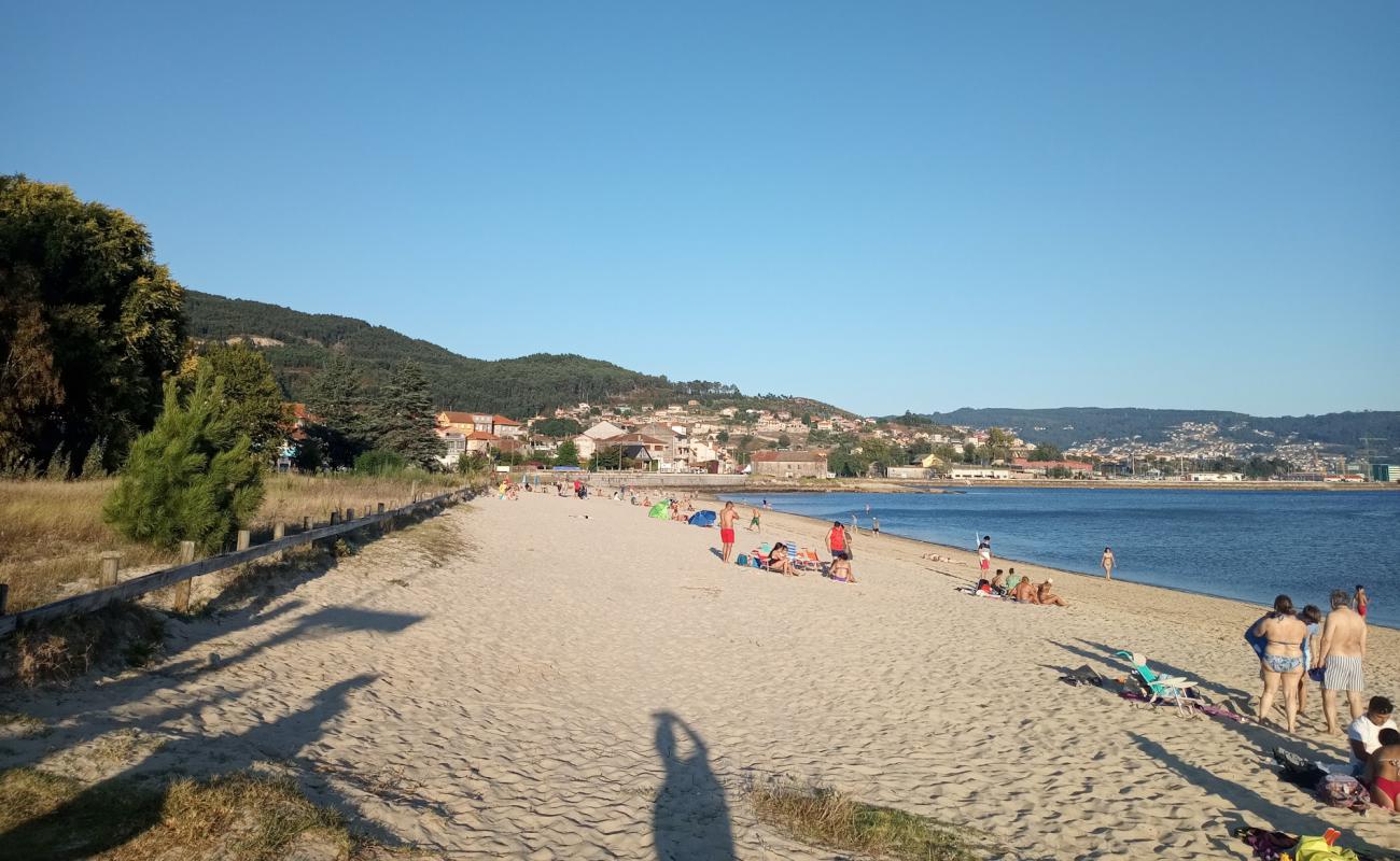 Фото Praia de Meira с светлый песок поверхностью