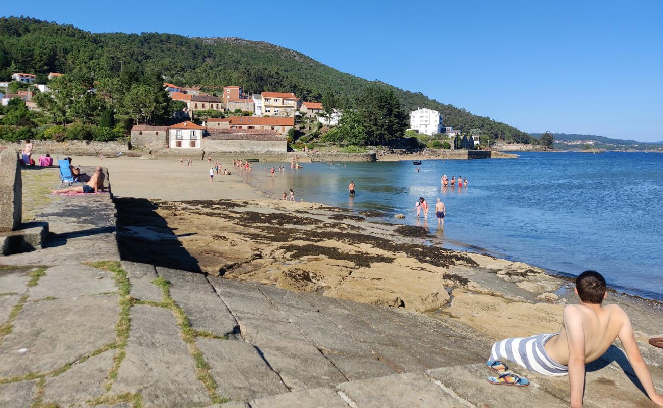 Фото Praia de Anido с светлый песок поверхностью