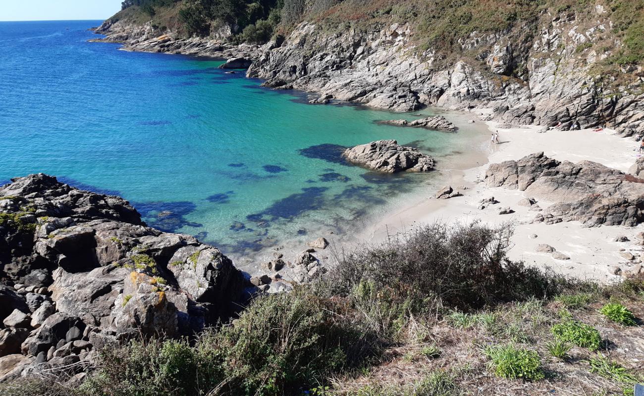 Фото Praia Corveiro с светлый песок поверхностью