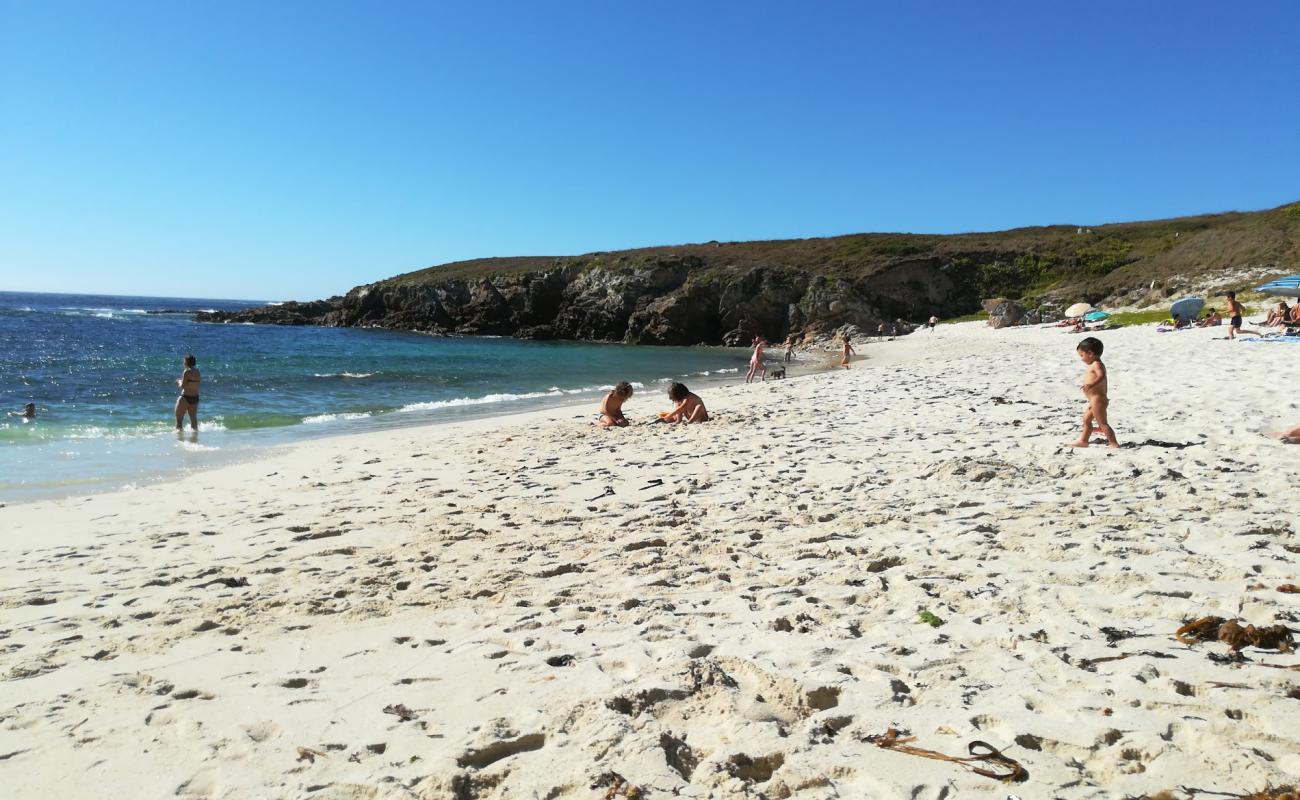 Фото Playa de Arnado с светлый песок поверхностью