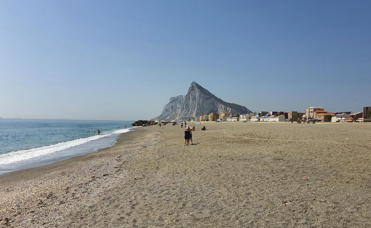 Фото Playa de la Atunara с серая чистая галька поверхностью