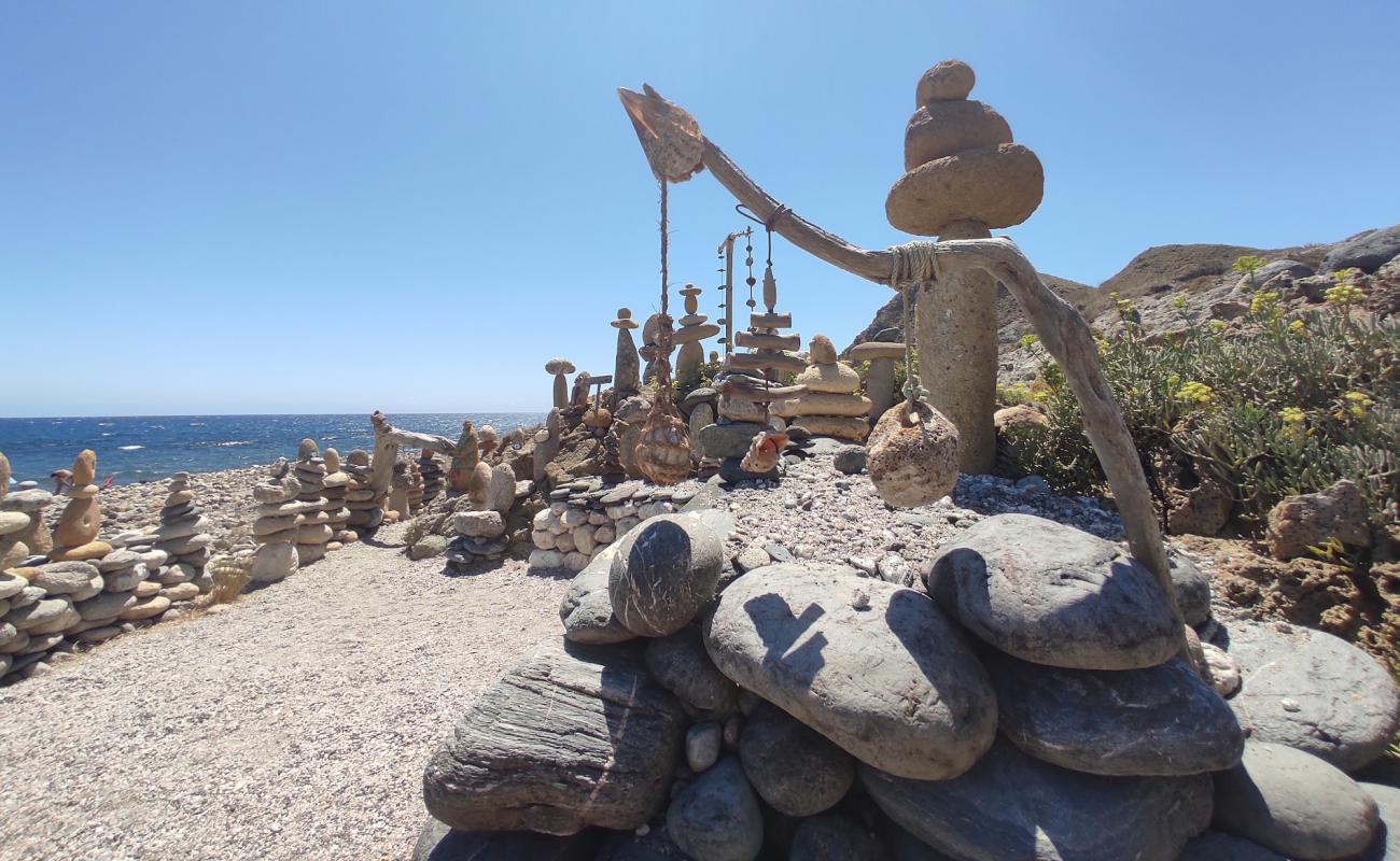 Фото Playa de la Galera с светлая галька поверхностью