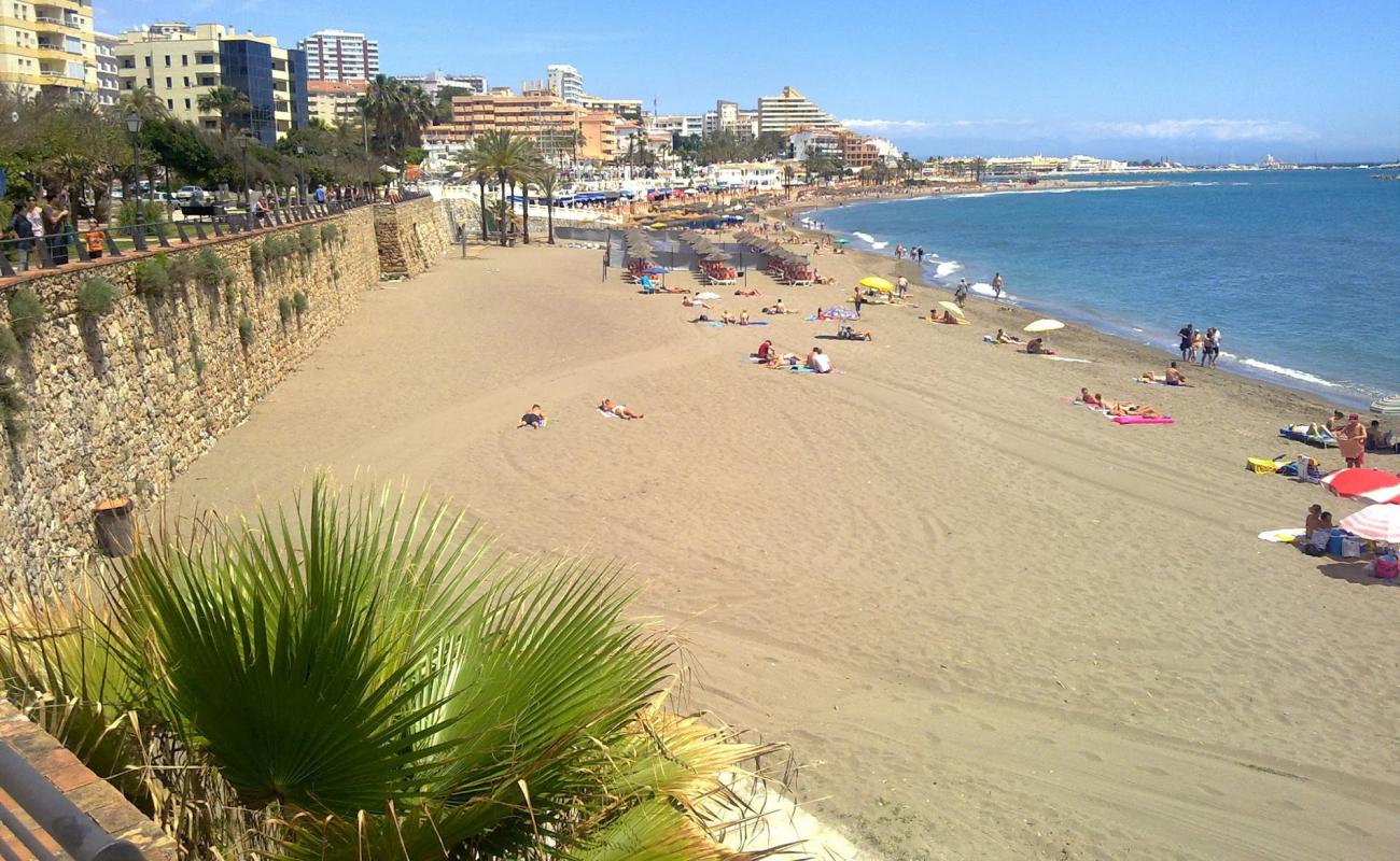 Фото Benalmadena beach с светлый песок поверхностью