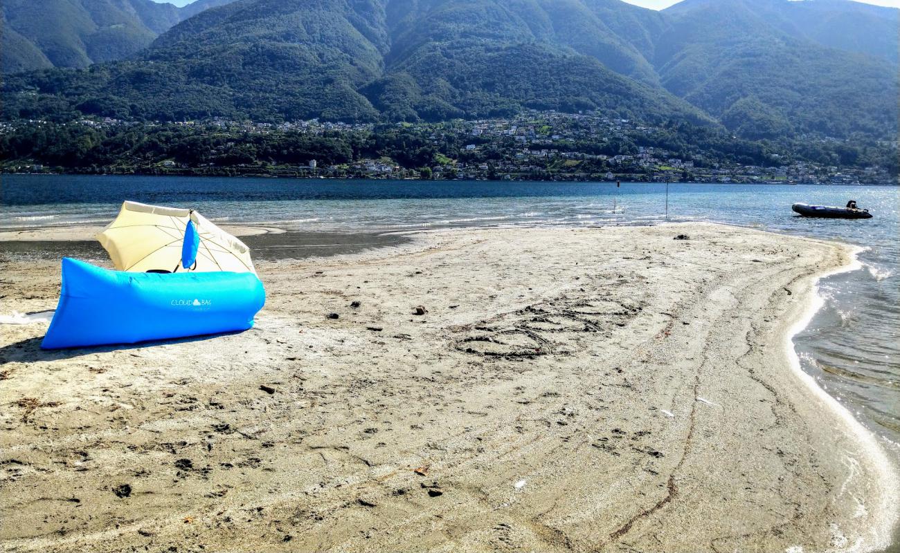 Фото Locarno spiaggia с светлый песок поверхностью