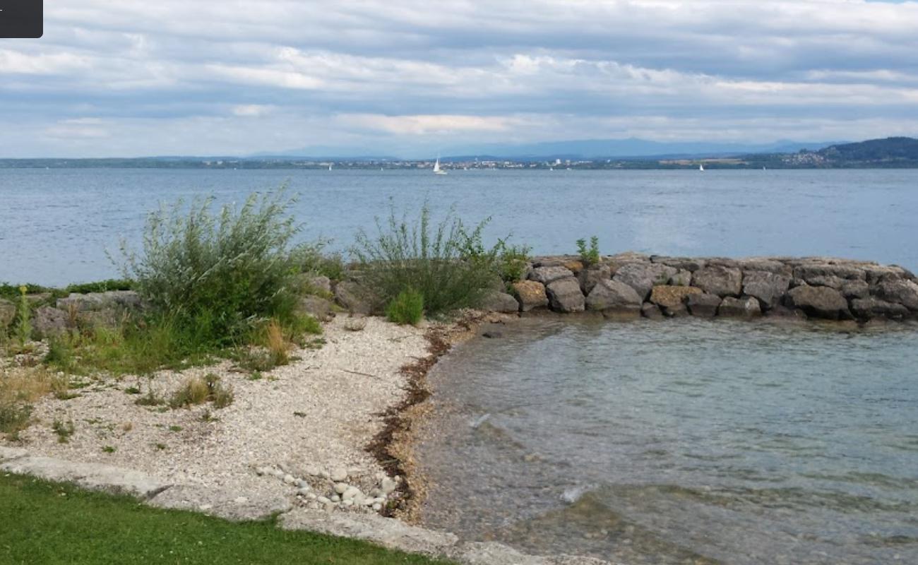 Фото Plage de Vaumarcus с светлая галька поверхностью