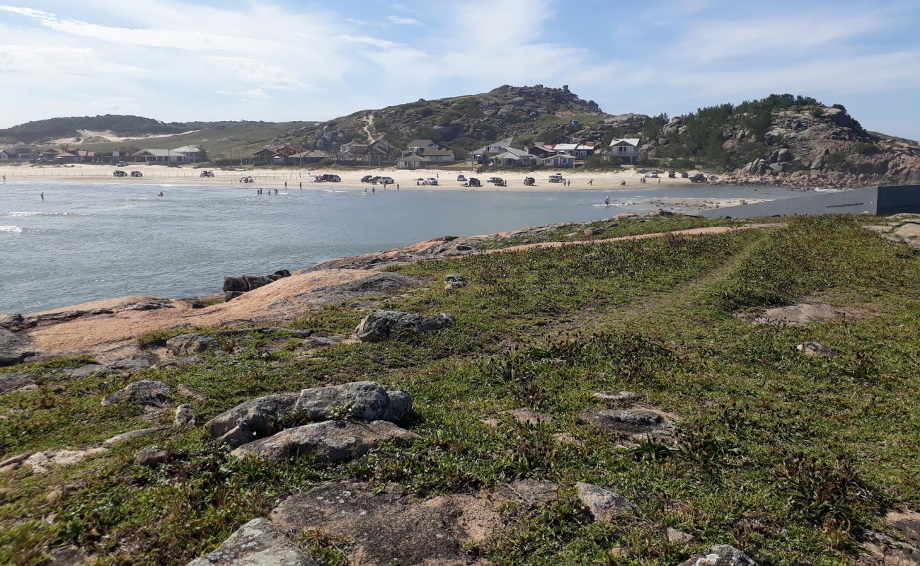 Фото Praia de Ipua с золотистый песок поверхностью