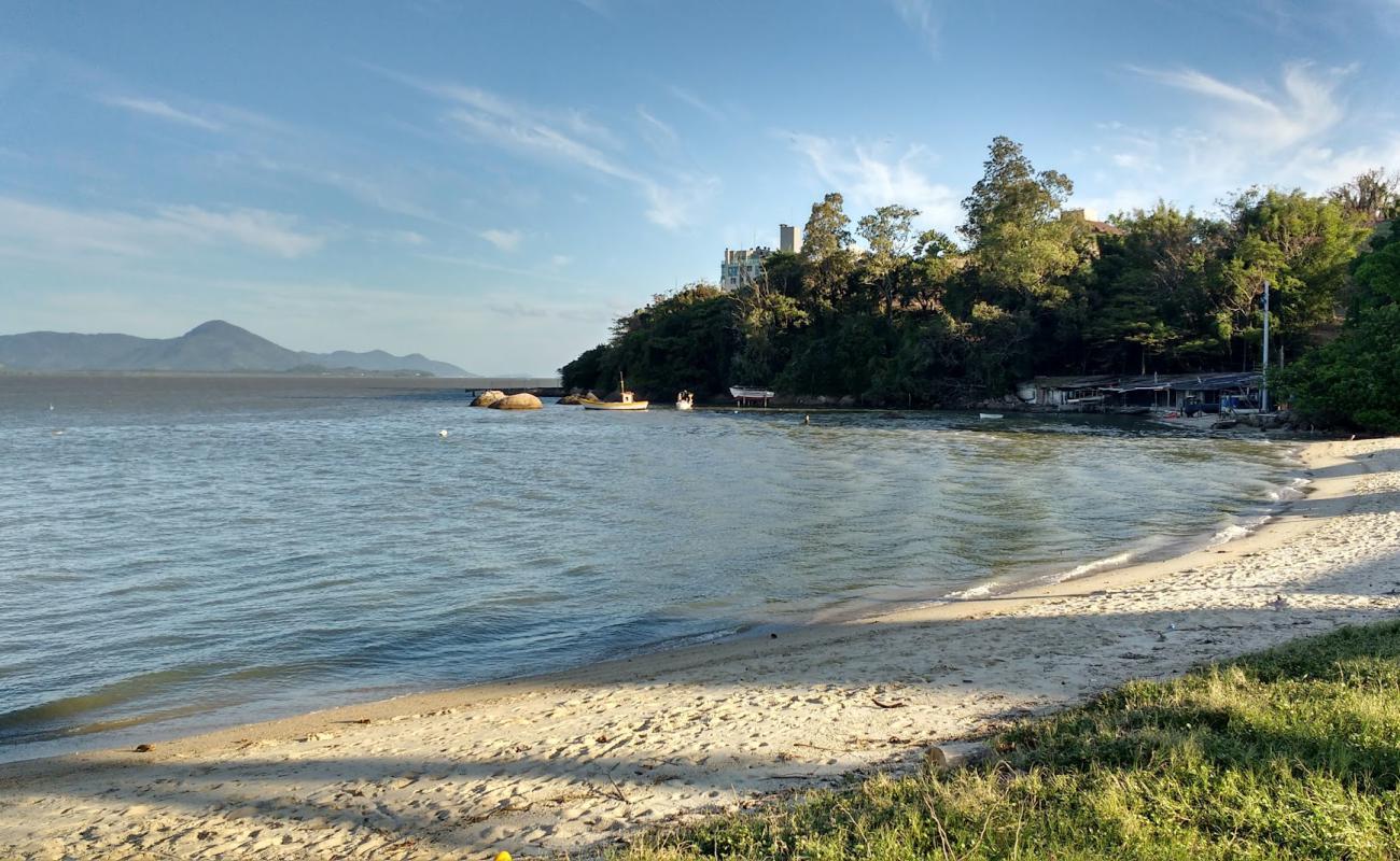 Фото Praia do Riso с светлый песок поверхностью