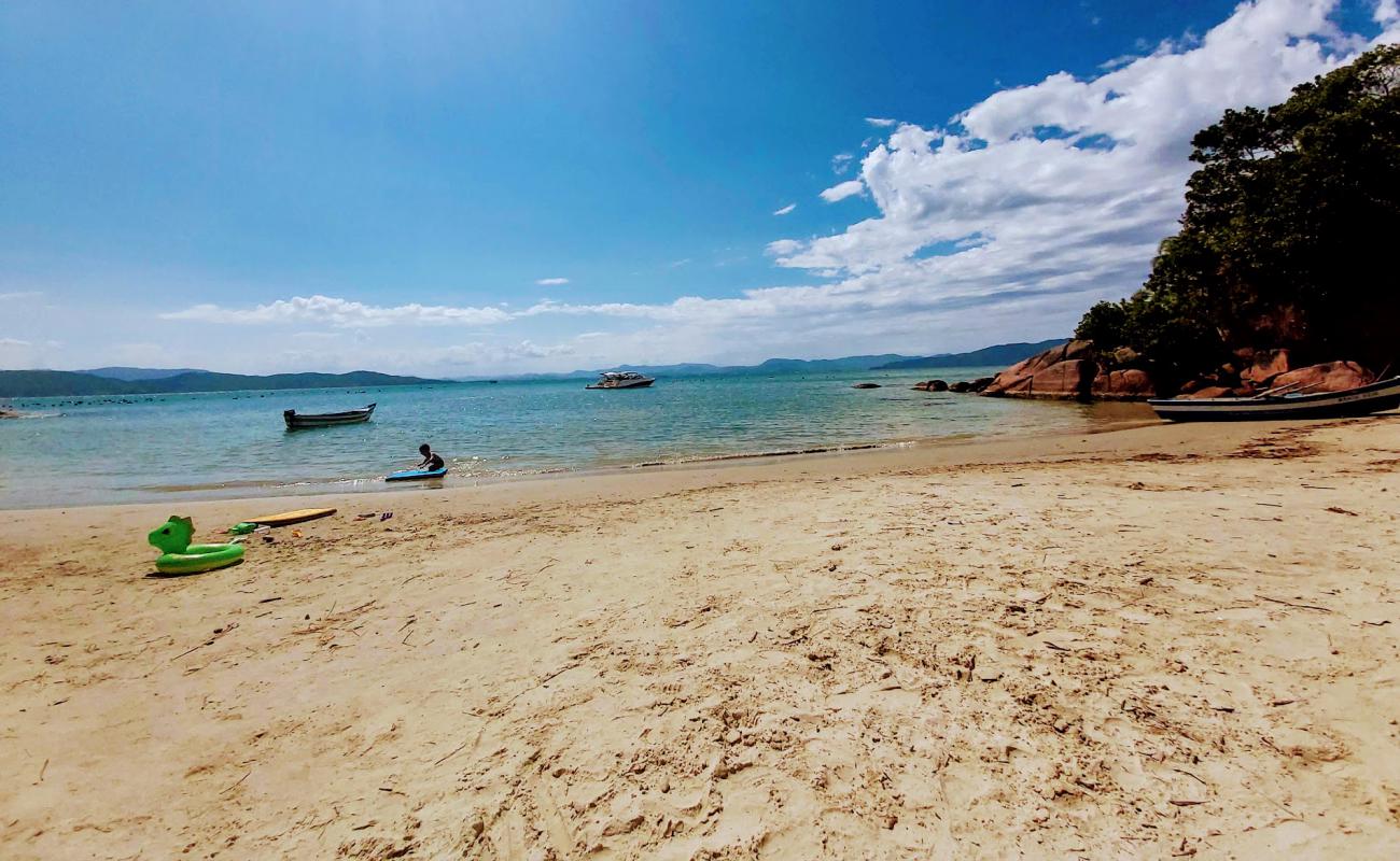 Фото Praia da Poiema с светлый песок поверхностью