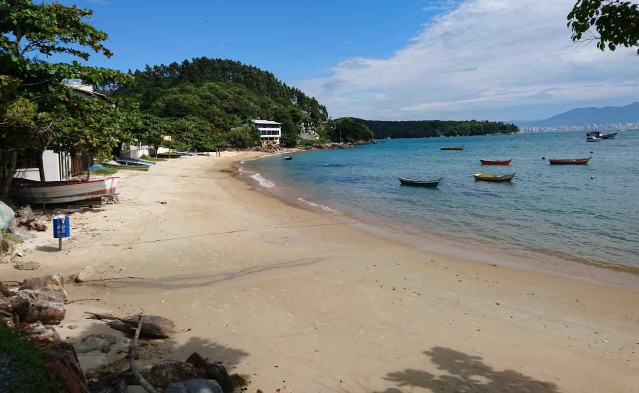 Фото Praia Caixa D Aco с светлый песок поверхностью