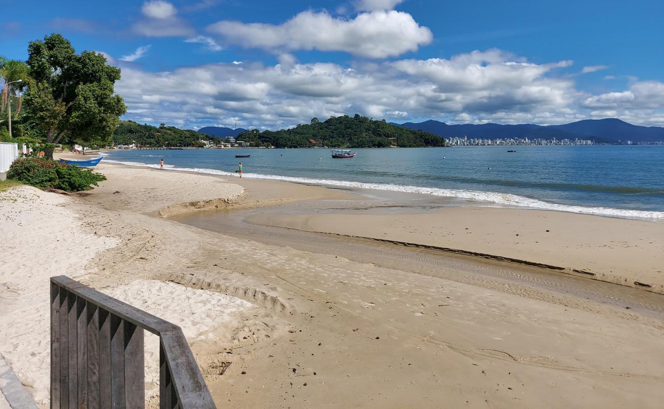 Фото Praia de Porto Belo с золотистый песок поверхностью