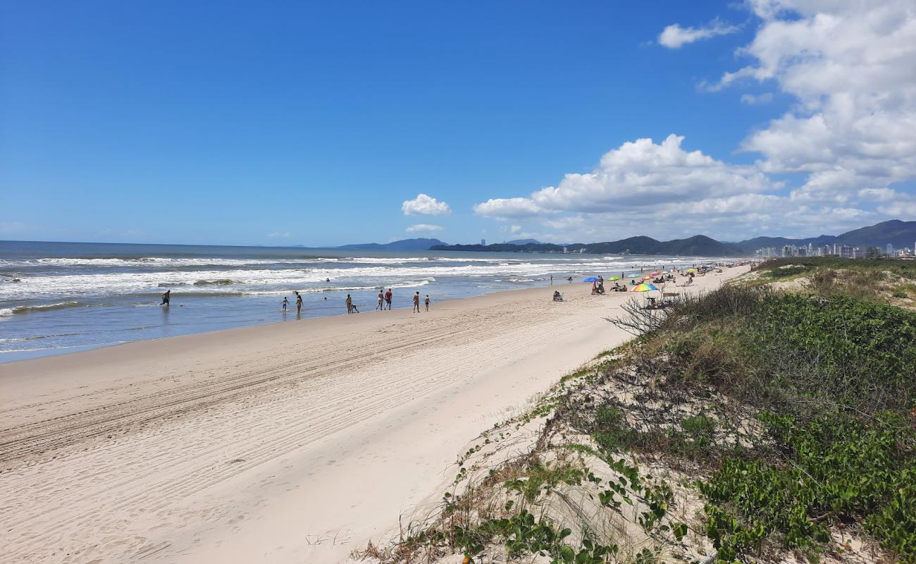 Фото Praia de Navegantes с золотистый песок поверхностью