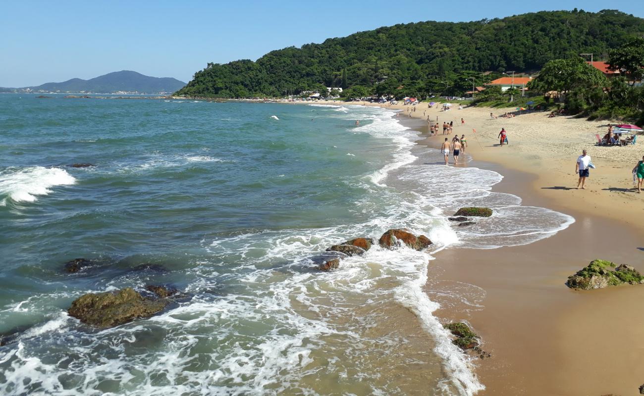 Фото Praia da Saudade с светлый песок поверхностью