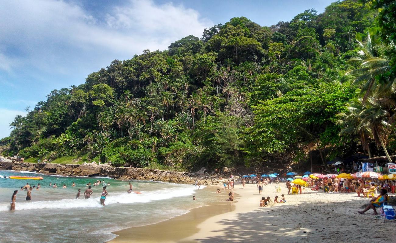 Фото Praia do Eden с золотистый песок поверхностью