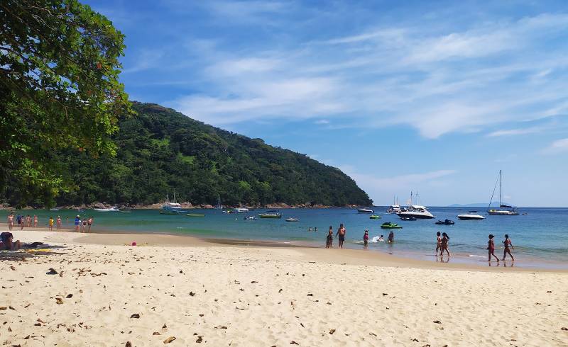 Фото Praia das Sete Pontas с золотистый песок поверхностью