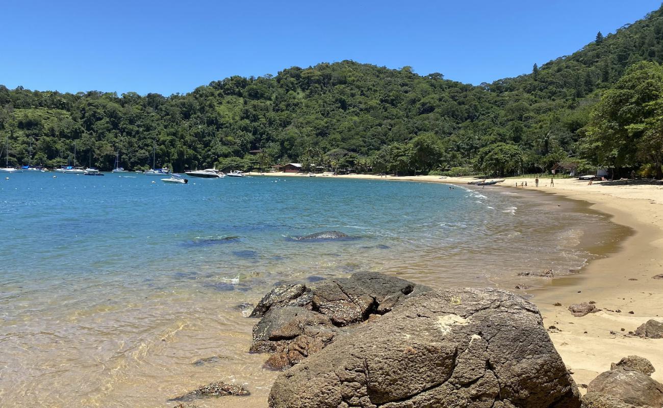 Фото Praia do Flamengo с золотистый песок поверхностью