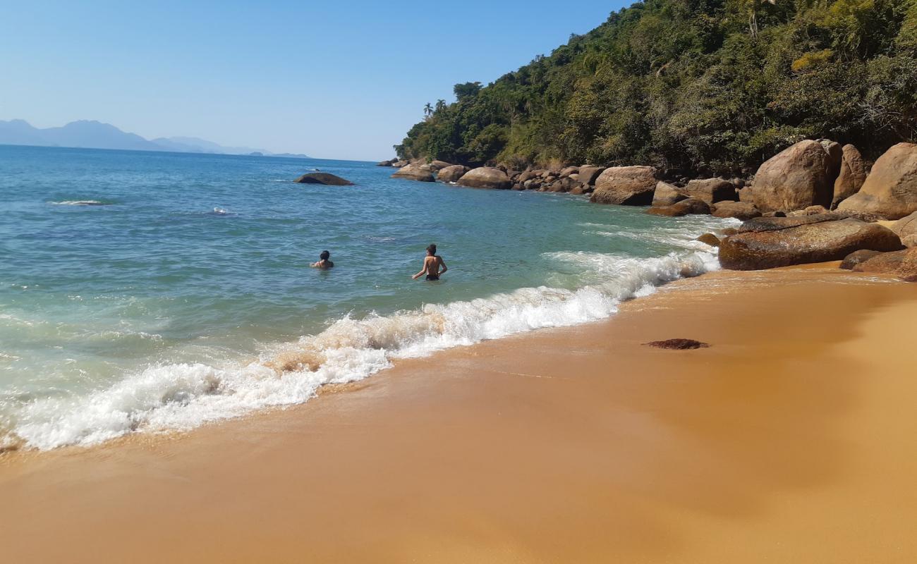 Фото Praia do Cedro с золотистый песок поверхностью