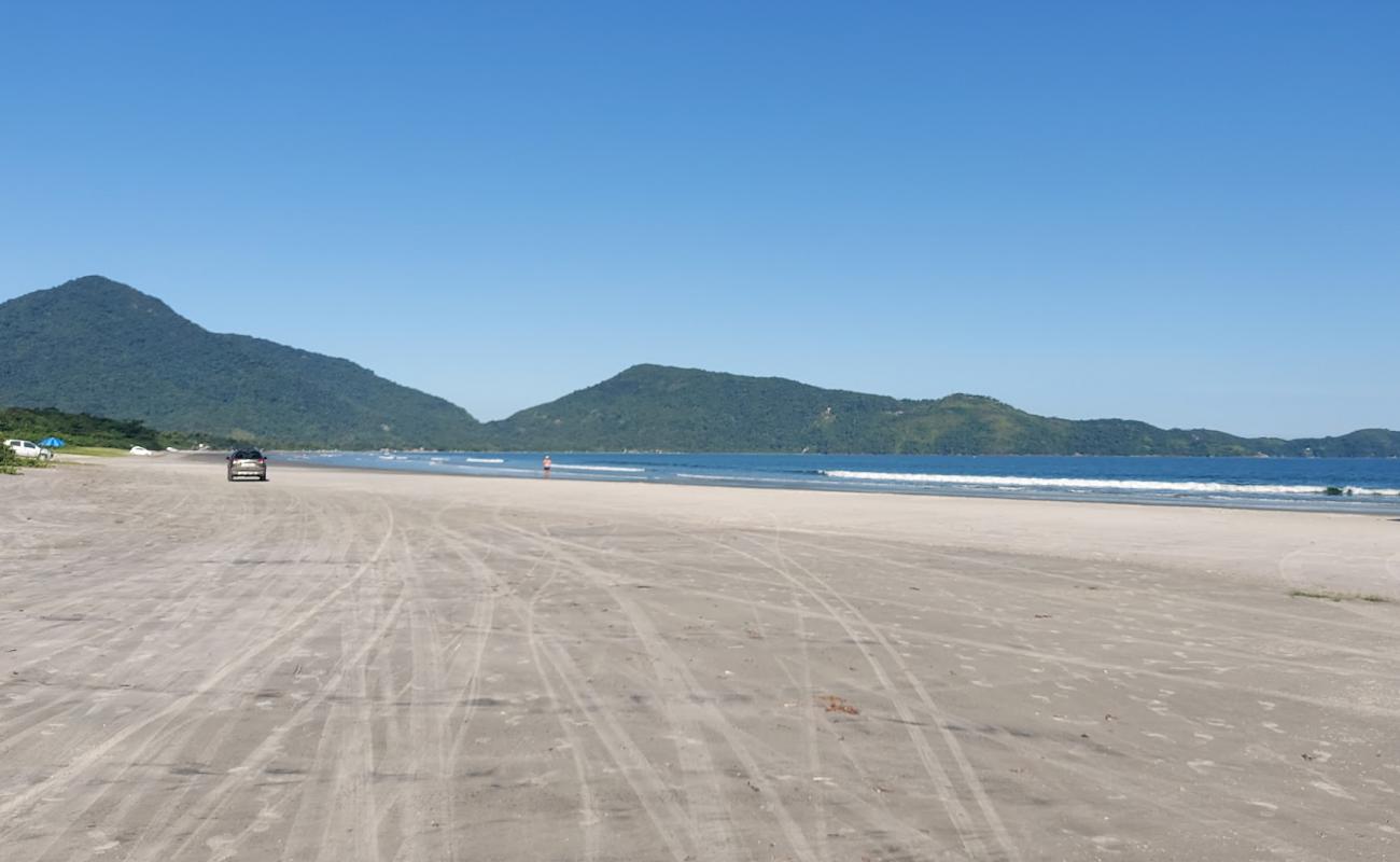 Фото Praia Ubatumirim с золотистый песок поверхностью