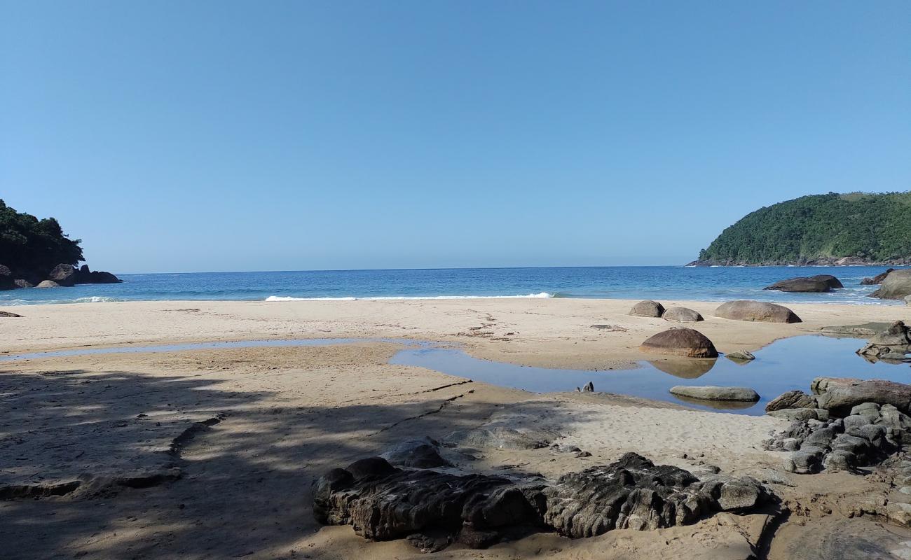 Фото Praia de Antiguinhos с золотистый песок поверхностью