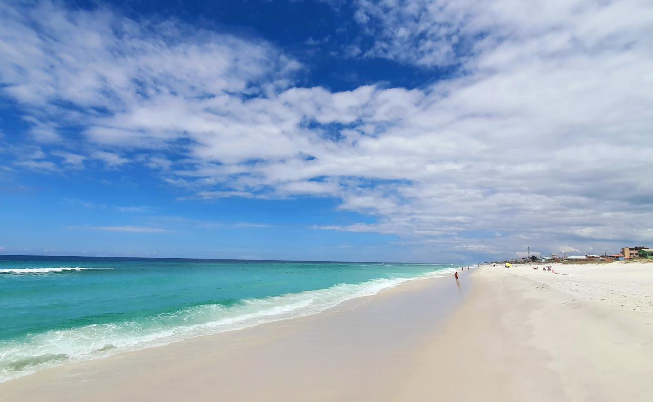 Фото Praia de Figueira с белый чистый песок поверхностью