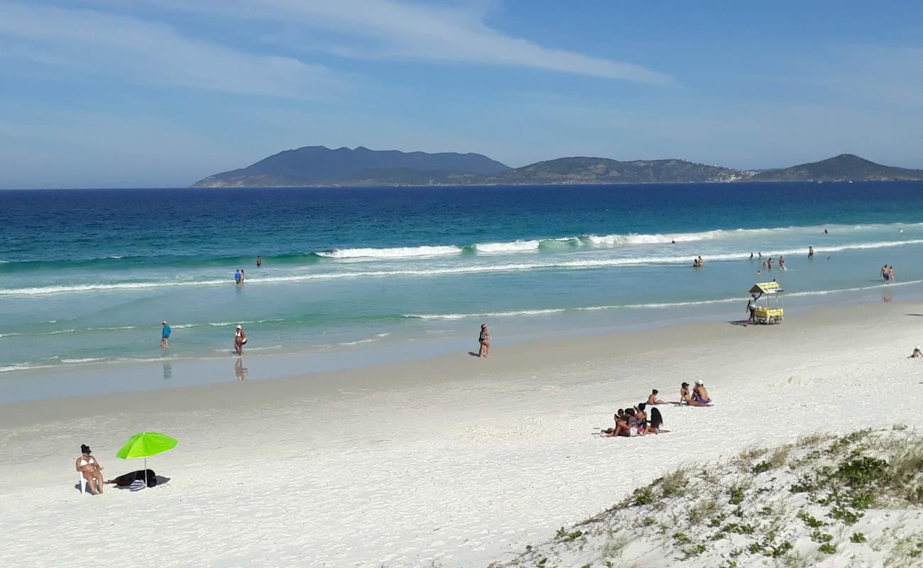 Фото Praia das Dunas с белый чистый песок поверхностью