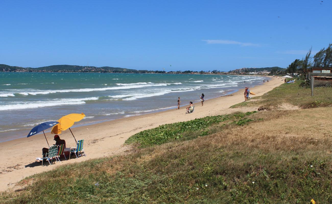 Фото Praia da Marina с светлый песок поверхностью