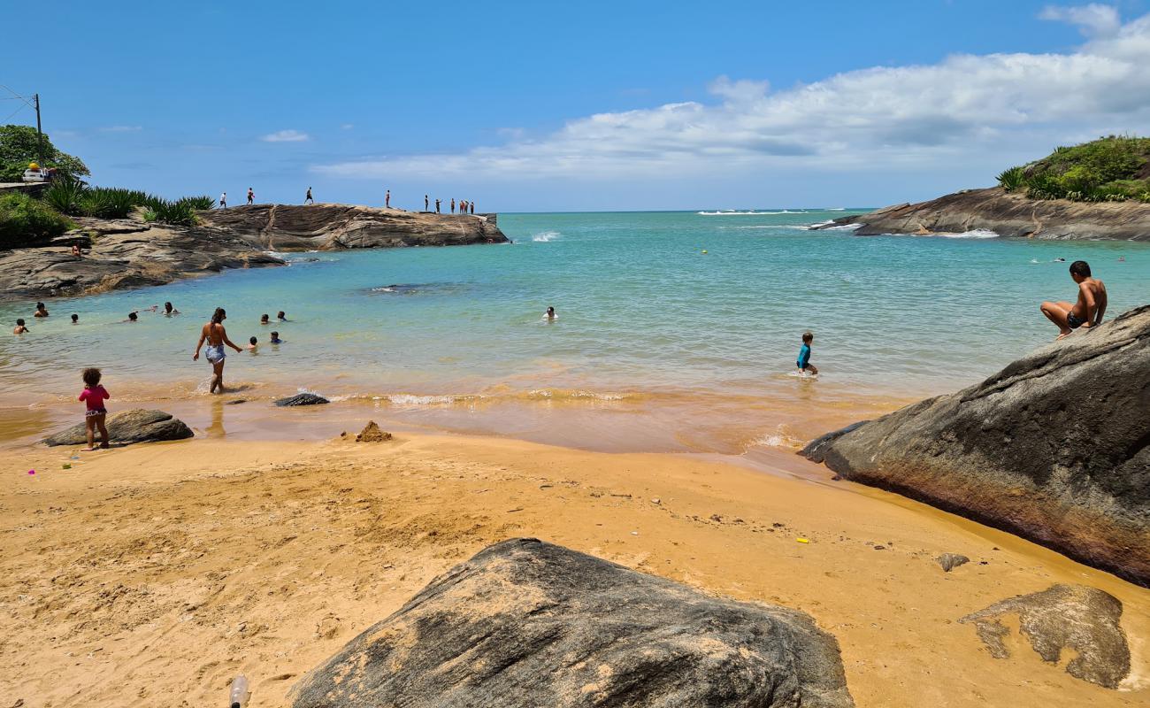 Фото Praia de Una с светлый песок поверхностью