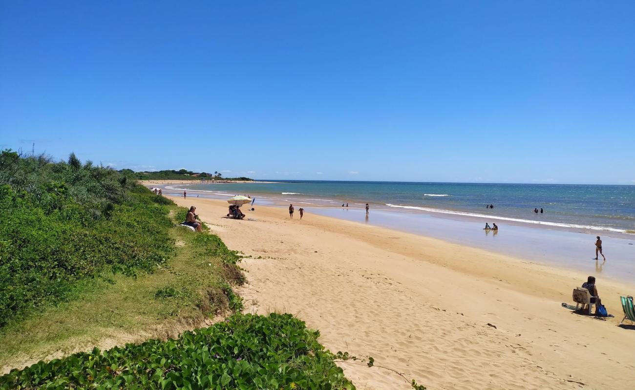 Фото Praia Ponta dos Fachos с светлый песок поверхностью