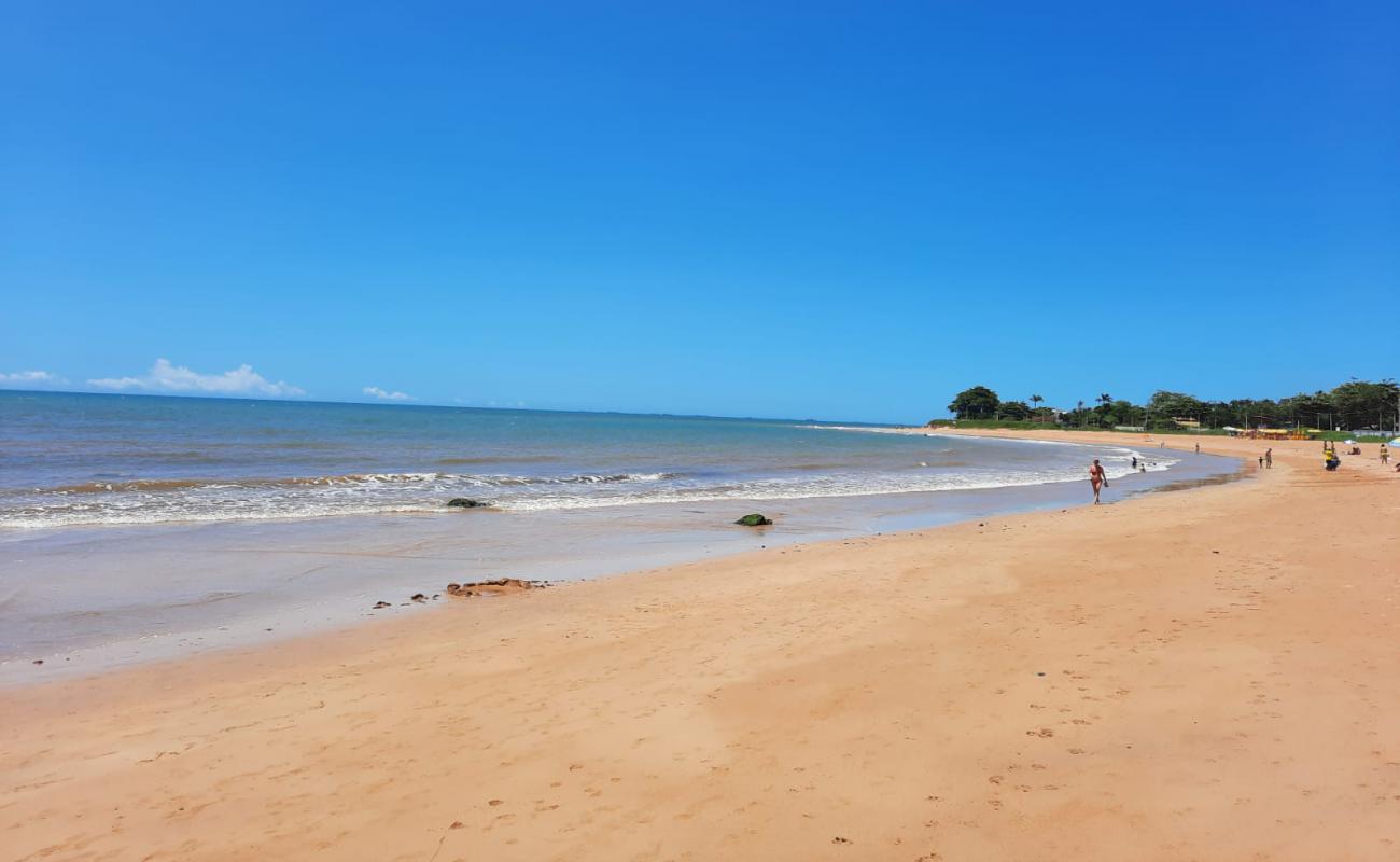 Фото Praia Enseada с светлый песок поверхностью