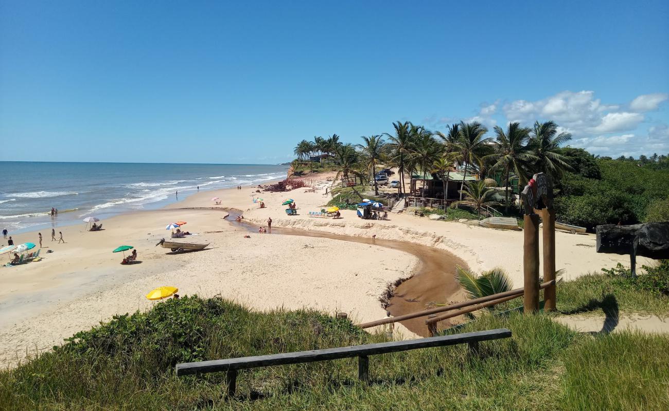 Фото Dourada Beach с светлый песок поверхностью