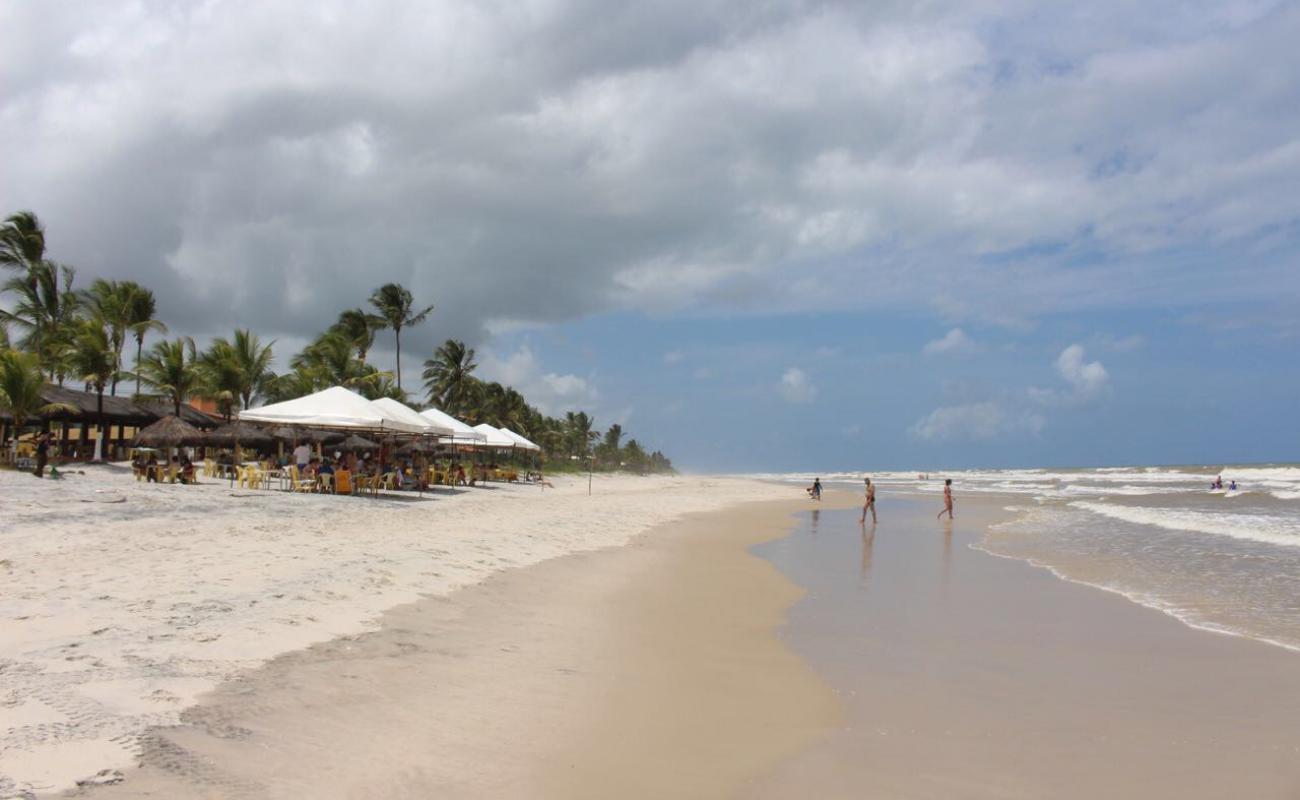 Фото Praia de Acuipe с золотистый песок поверхностью