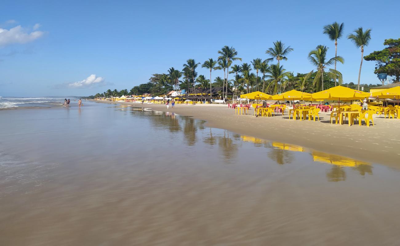 Фото Praia Dos Milionarios с золотистый песок поверхностью