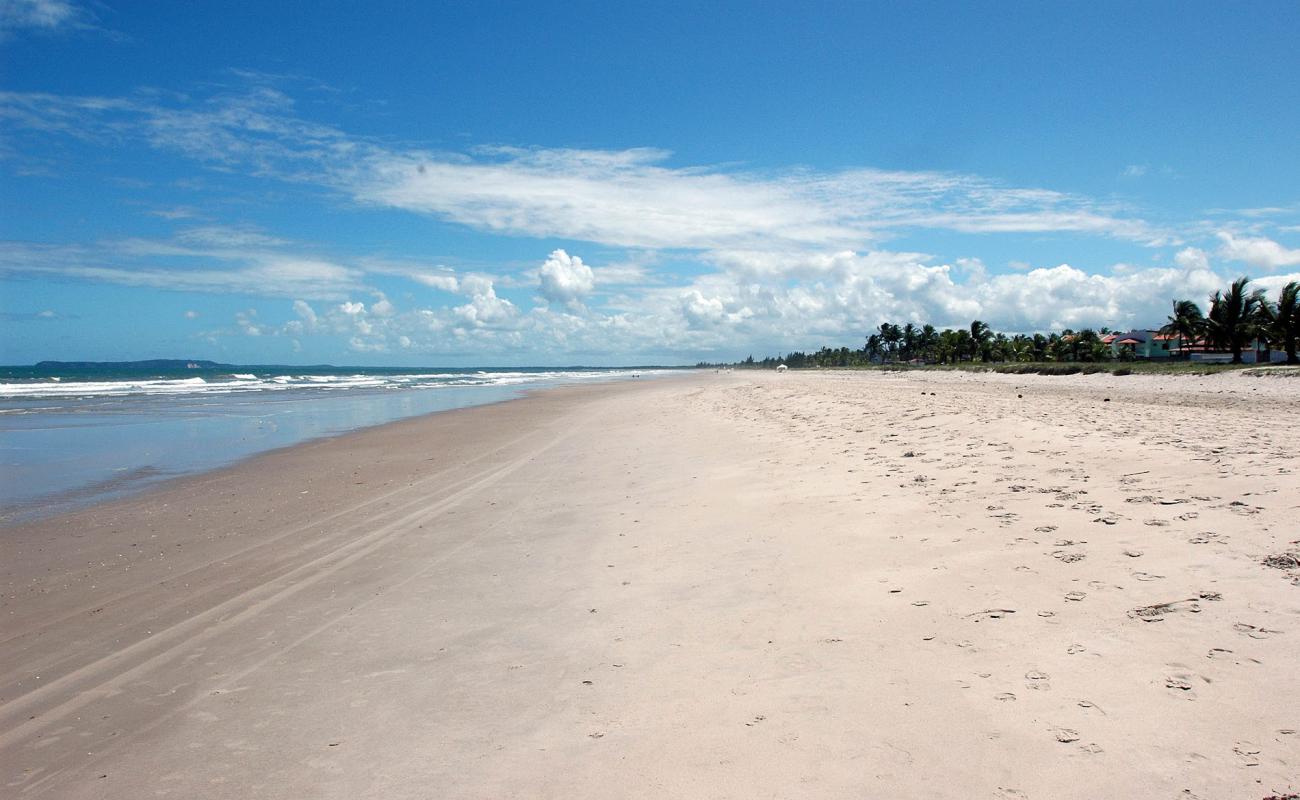 Фото Praia de Guaibim с золотистый песок поверхностью