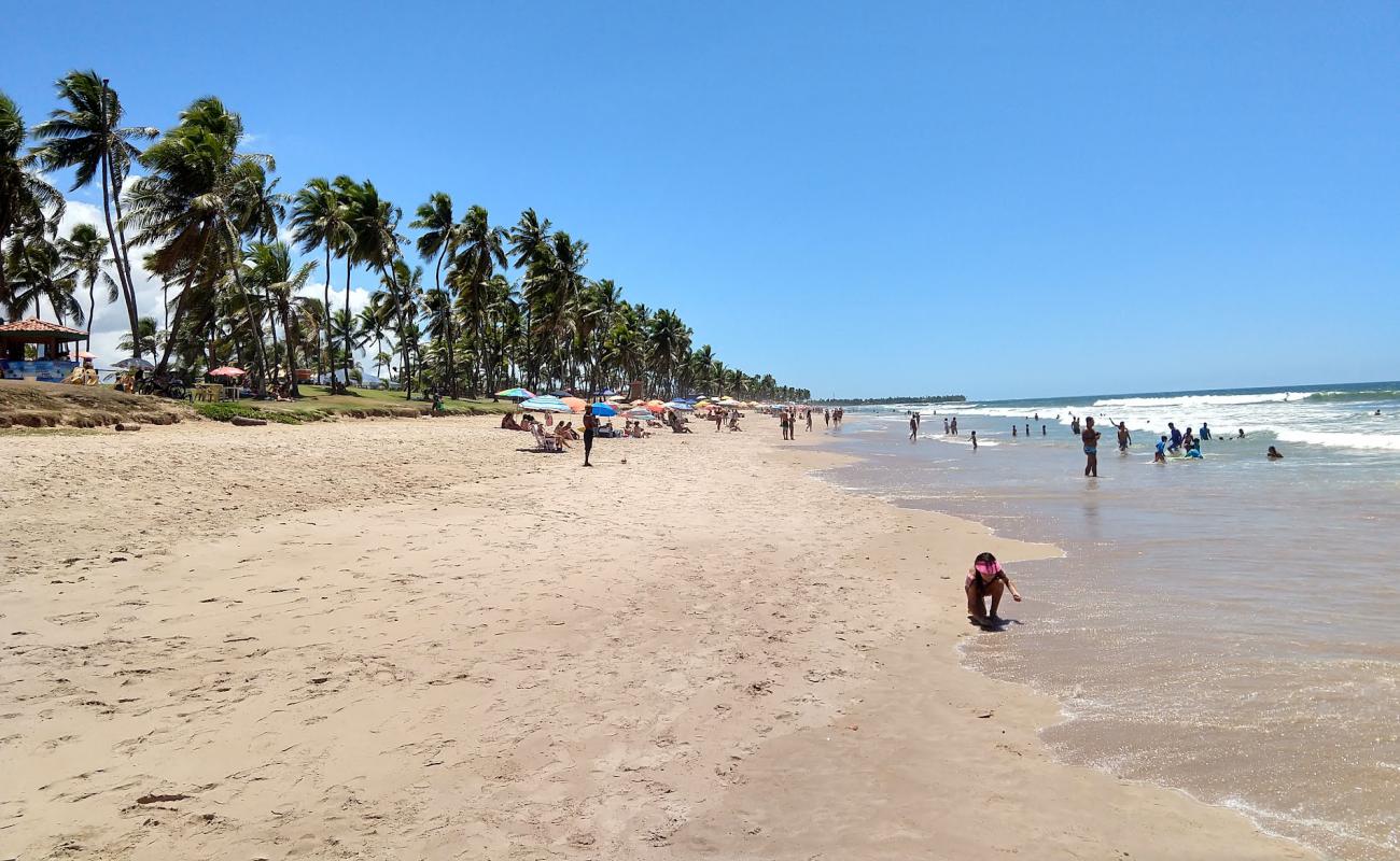 Фото Praia de Buraquinho с светлый песок поверхностью