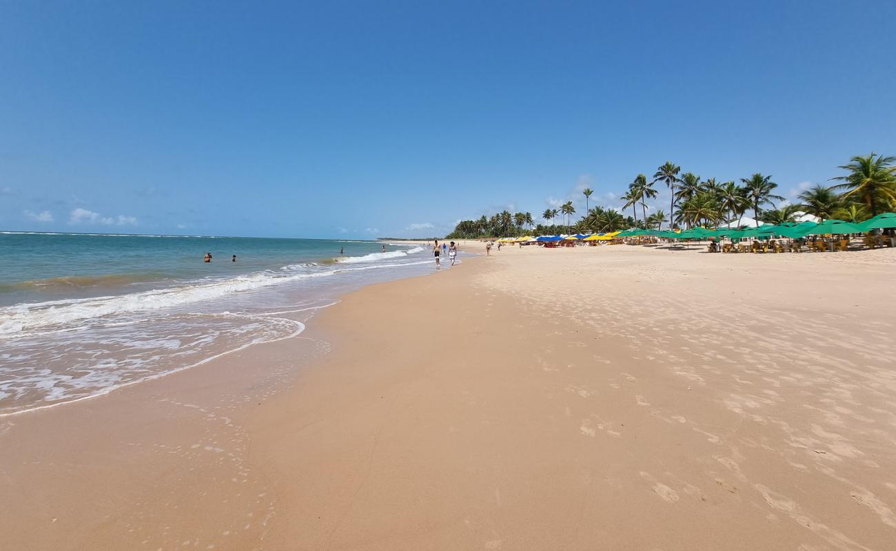 Фото Praia de Guarajuba с светлый песок поверхностью