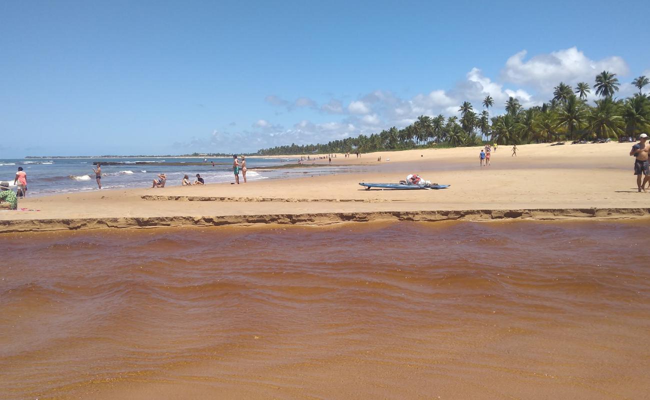 Фото Praia das Ondas с светлый песок поверхностью