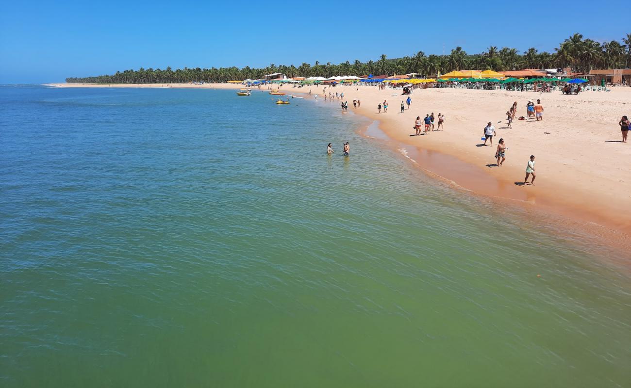 Фото Praia do Gunga с светлый песок поверхностью