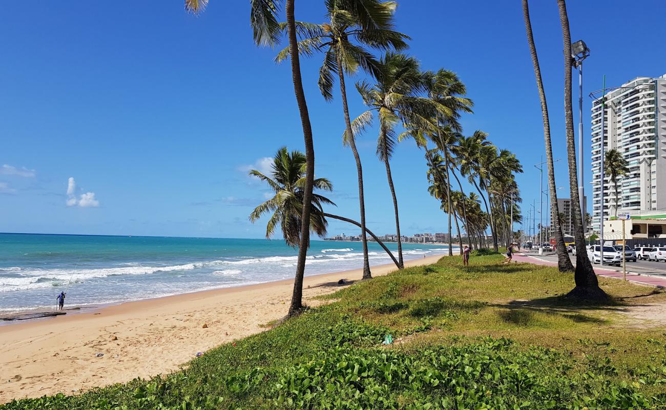 Фото Praia de Jacarecica с светлый песок поверхностью