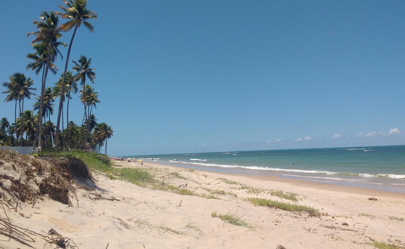 Фото Praia das Caletas с светлый песок поверхностью