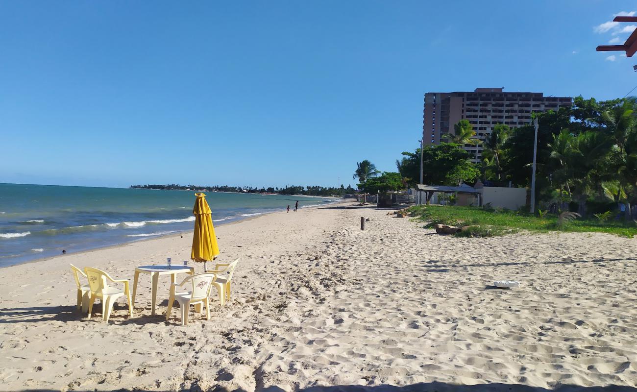 Фото Praia de Maria Farinha с светлый песок поверхностью