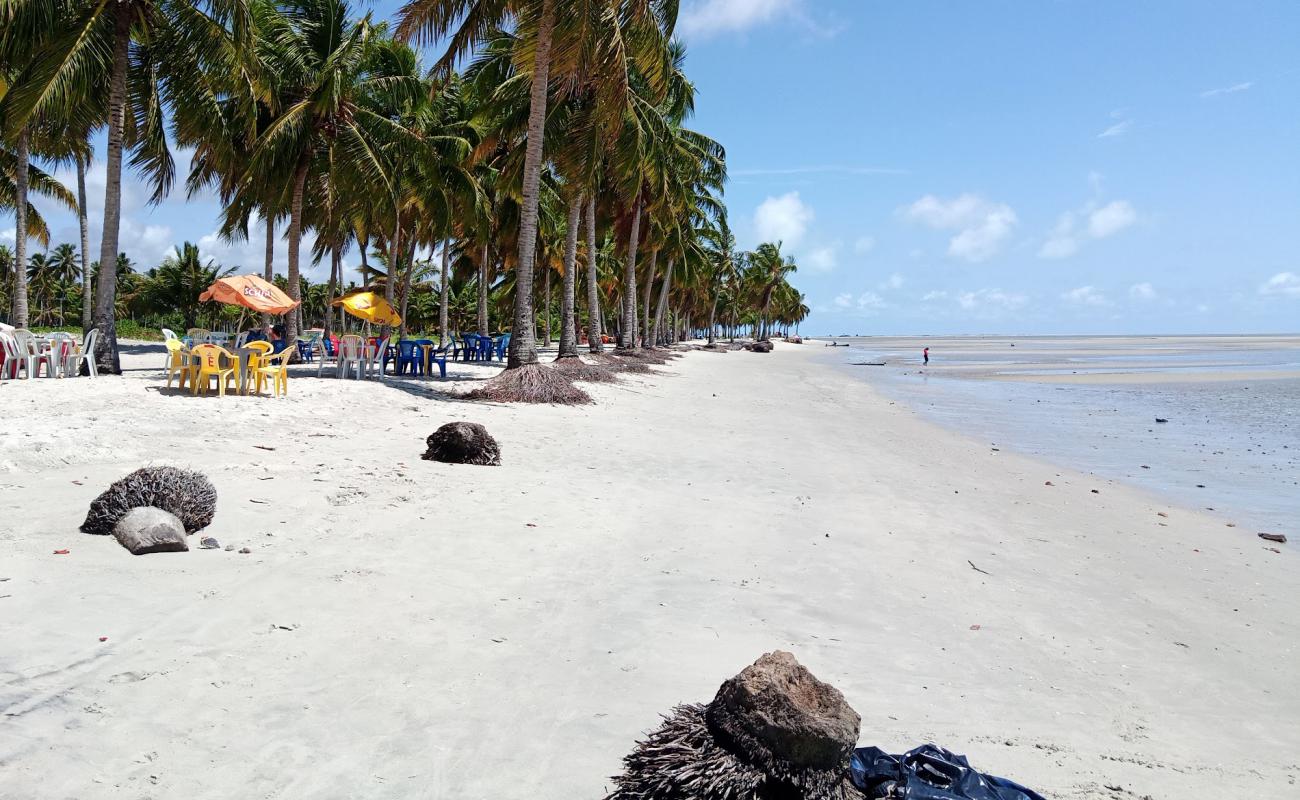 Фото Praia do Capitao с светлый песок поверхностью