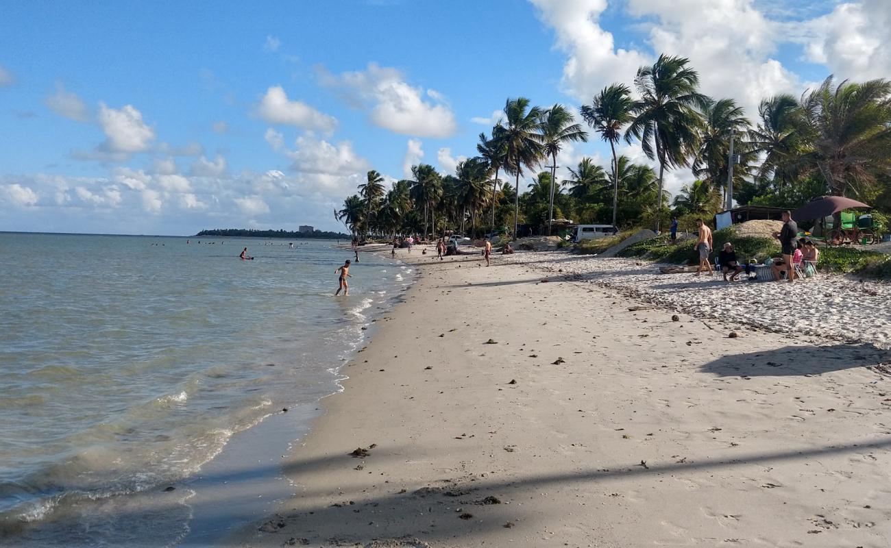 Фото Praia do Capitao II с светлый песок поверхностью