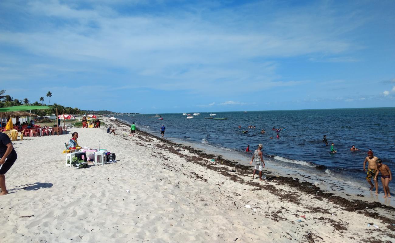 Фото Praia de Catuama с светлый песок поверхностью