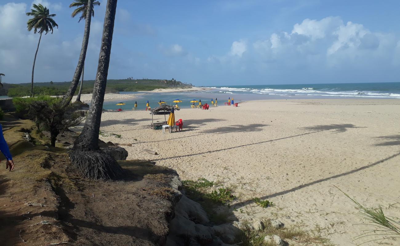 Фото Praia da Barra do Grau с золотистый песок поверхностью