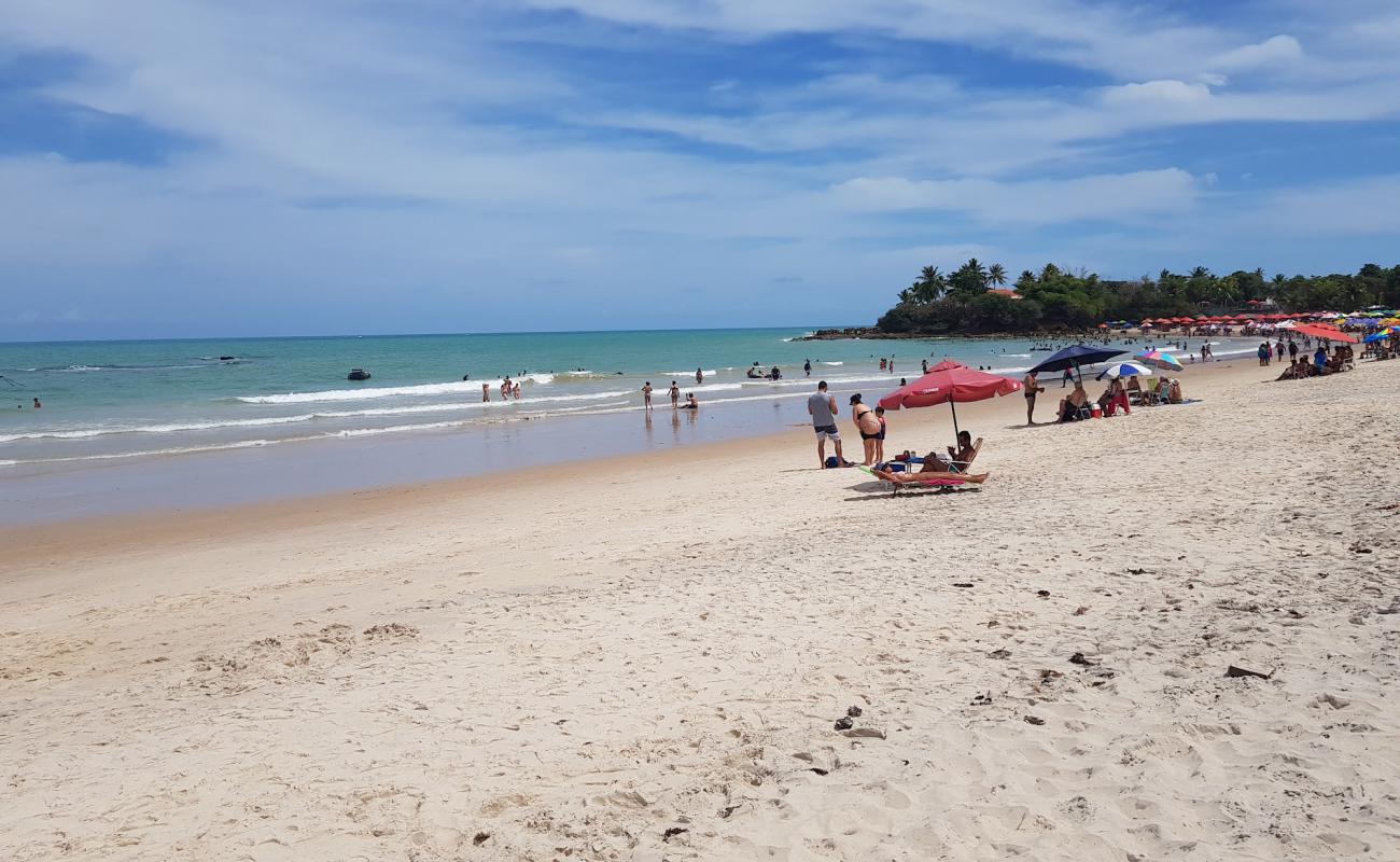 Фото Praia do Amor с светлый песок поверхностью