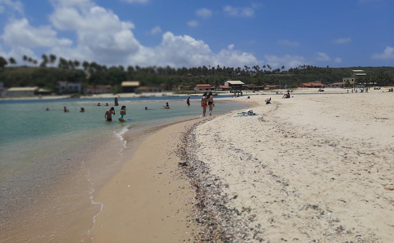 Фото Praia Barra de Cunhau с светлый песок поверхностью