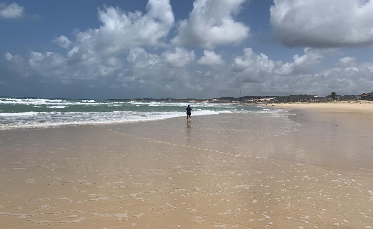 Фото Praia de Buzios II с светлый песок поверхностью