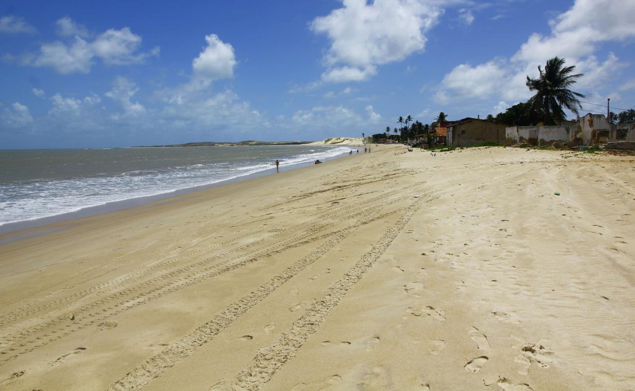 Фото Praia da Pititinga с золотистый песок поверхностью