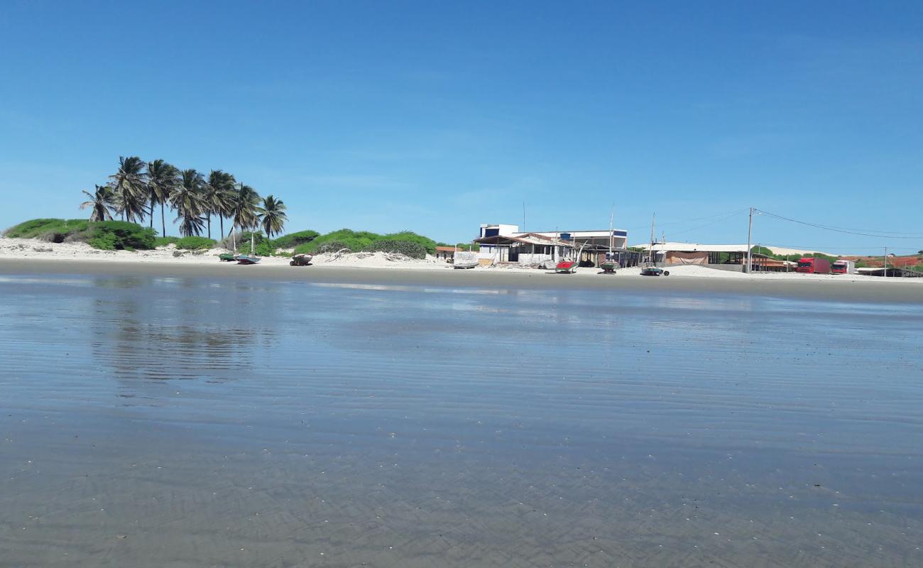 Фото Praia do Rosado с светлый песок поверхностью