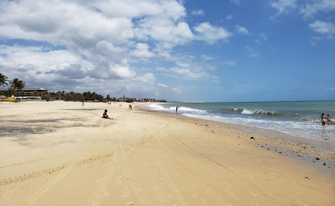 Фото Praia do Cumbuco II с светлый песок поверхностью